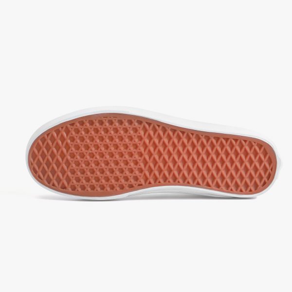 Sole of a pair of white low-top canvas shoes