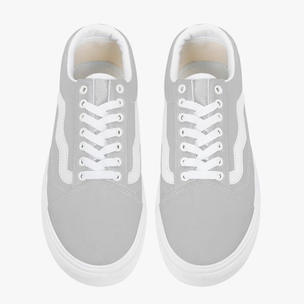 A pair of grey low-top canvas sneakers