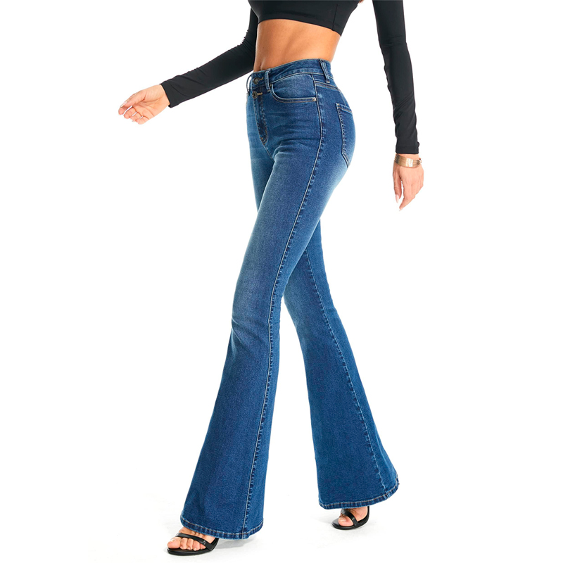 A female model wearing a pair of flare jeans