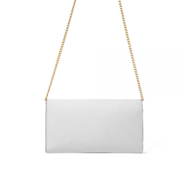 A white messenger bag with metal chains suspended in mid-air with its back facing us.