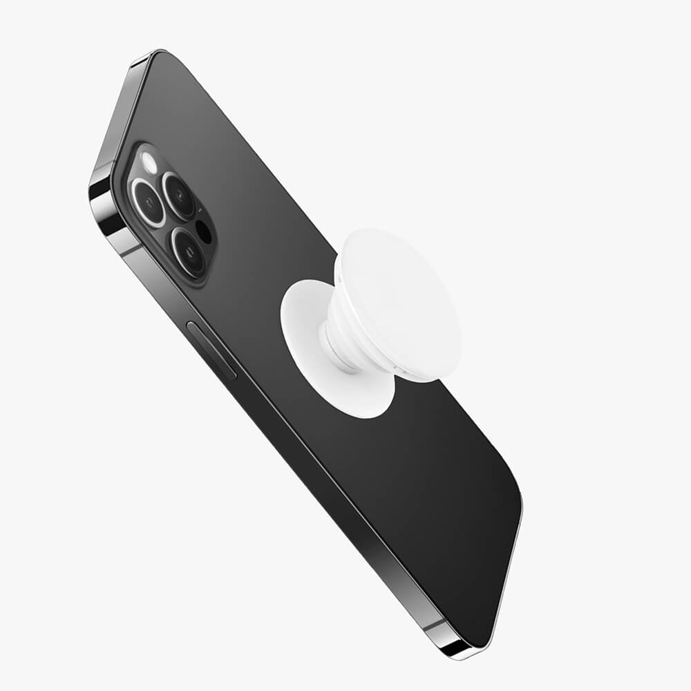 A white phone holder is glued to the back of an iPhone