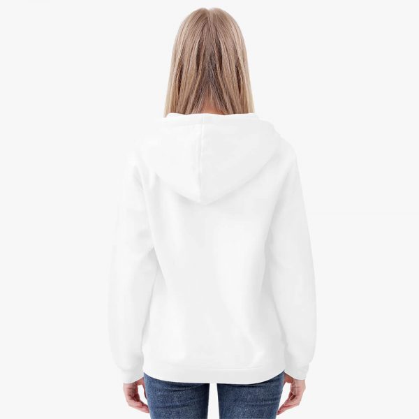 woman in a white cropped hoodie with her back to the camera