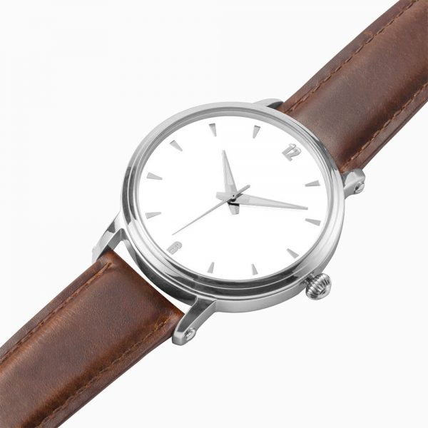 A mechanical watch with a white dial and a brown strap.