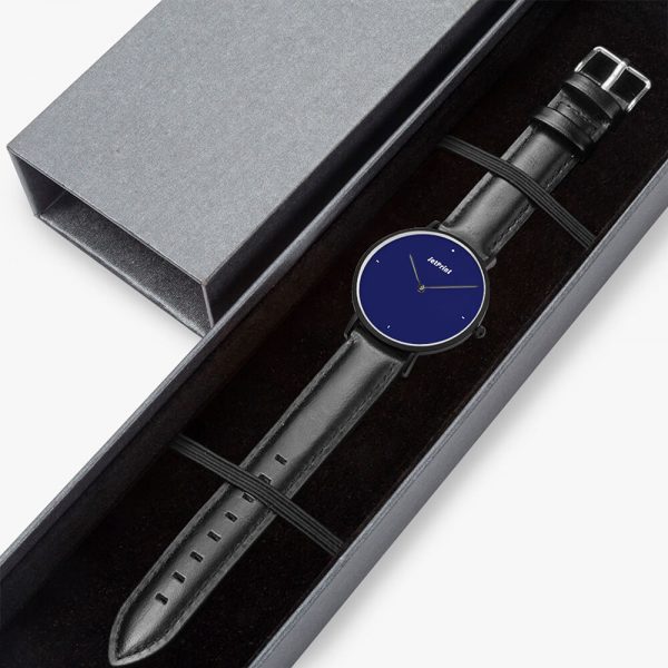 A black quartz watch is packed into a gift box