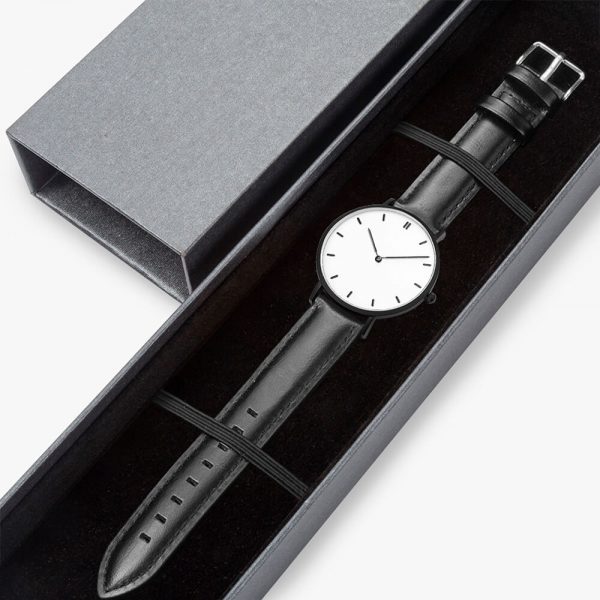 A black quartz watch is packaged in a gift box