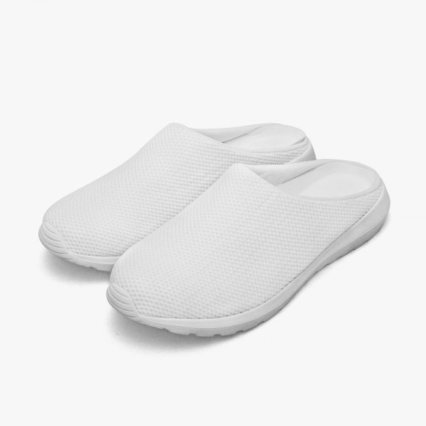 A pair of white home breathable slippers