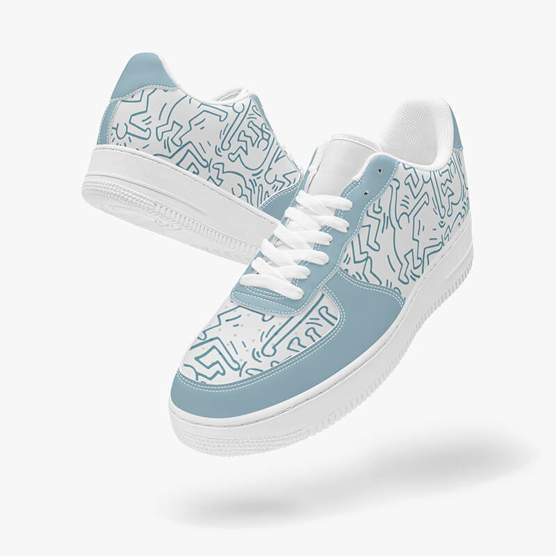 A pair of blue graffiti low-top shoes