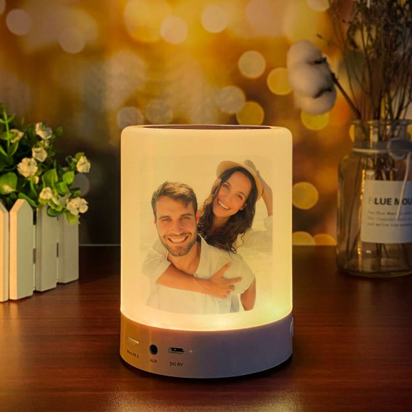 A couple printed on a bluetooth night light speaker