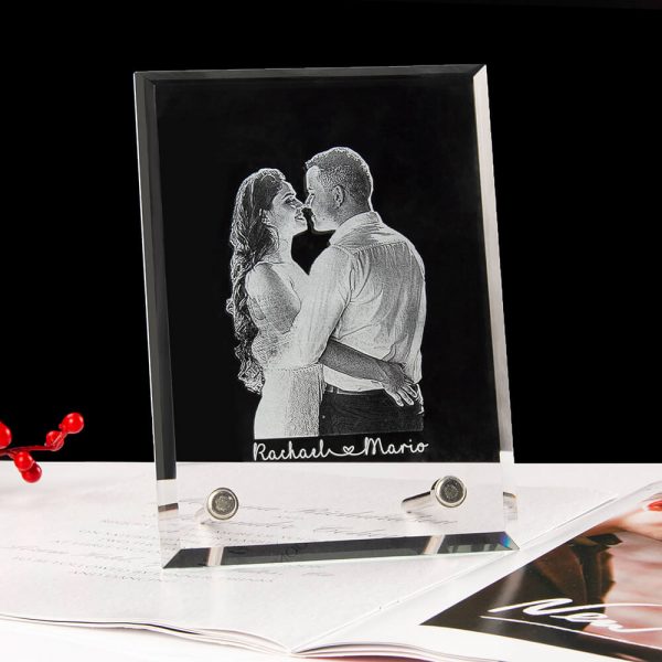 A photo of a couple is customised in a crystal photo frame