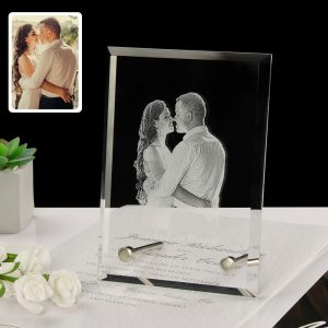 A photo of a couple is customised in a crystal photo frame