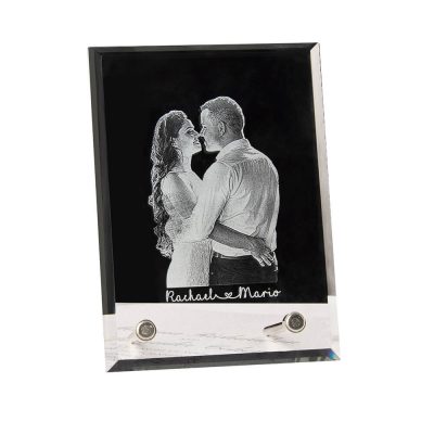 A photo of a couple is customised in a crystal photo frame