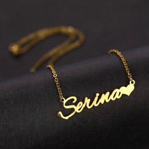 a gold necklace with a name