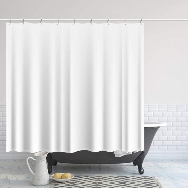 A white shower curtain is hung in the bathroom