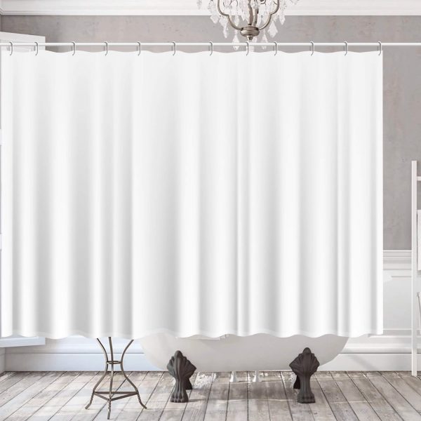 A white shower curtain is hung in the bathroom