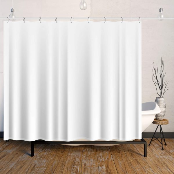 A white shower curtain is hung in the bathroom