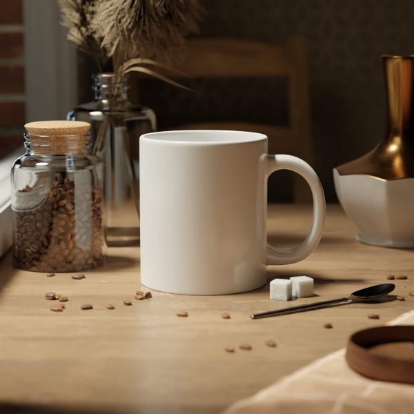 A white ceramic mug is placed on the table