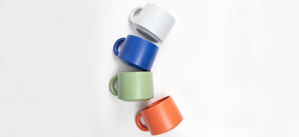 Four different colored cups