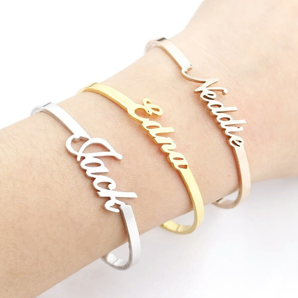 Three custom name bracelets in gold, silver, rose gold