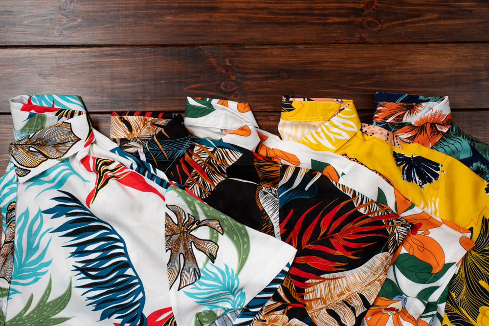 many different patterned aloha shirts are put together