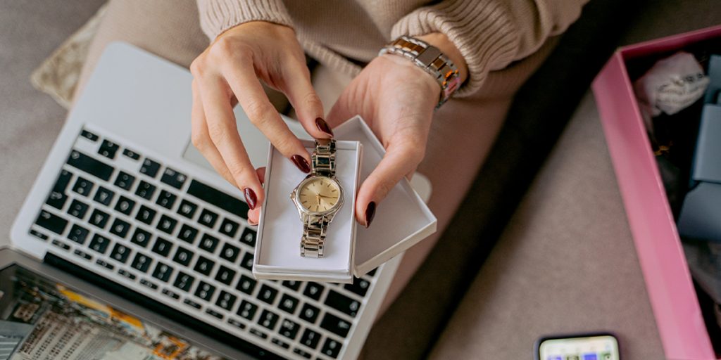 A woman is admiring her new watch