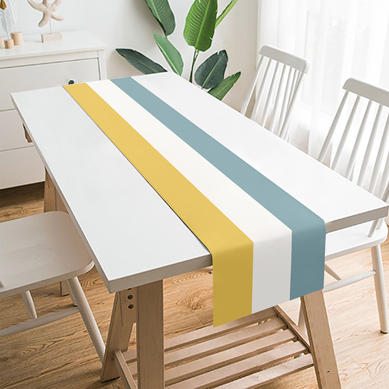 a three-color table runner is placed on the table