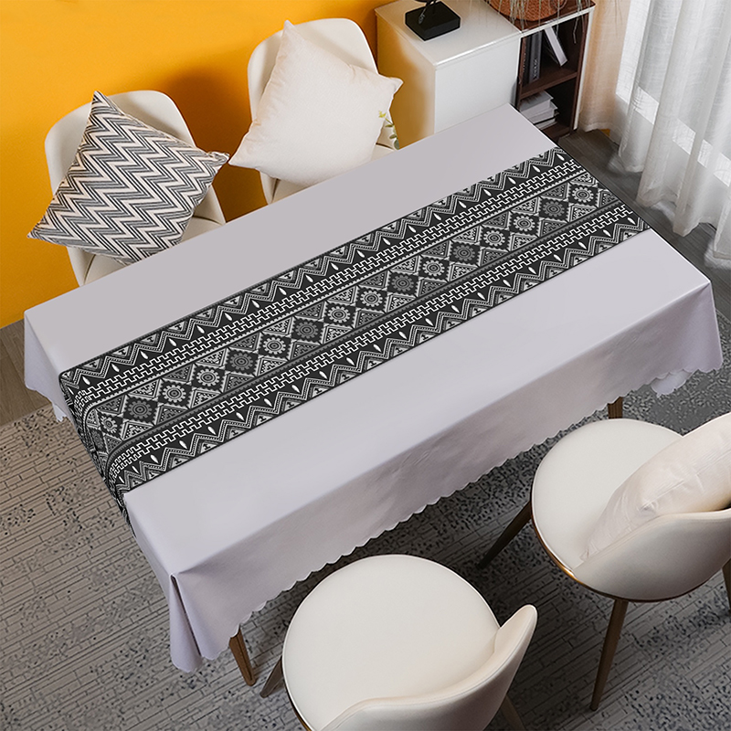 A black totem table runner is placed on the table