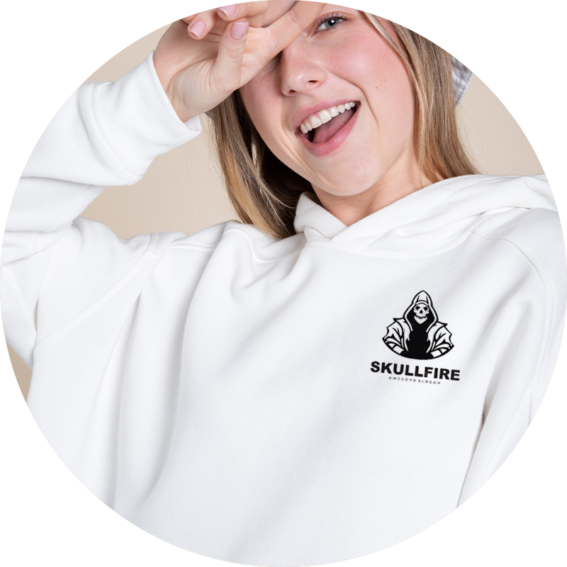 A girl is wearing a white hoodie with a logo on it.