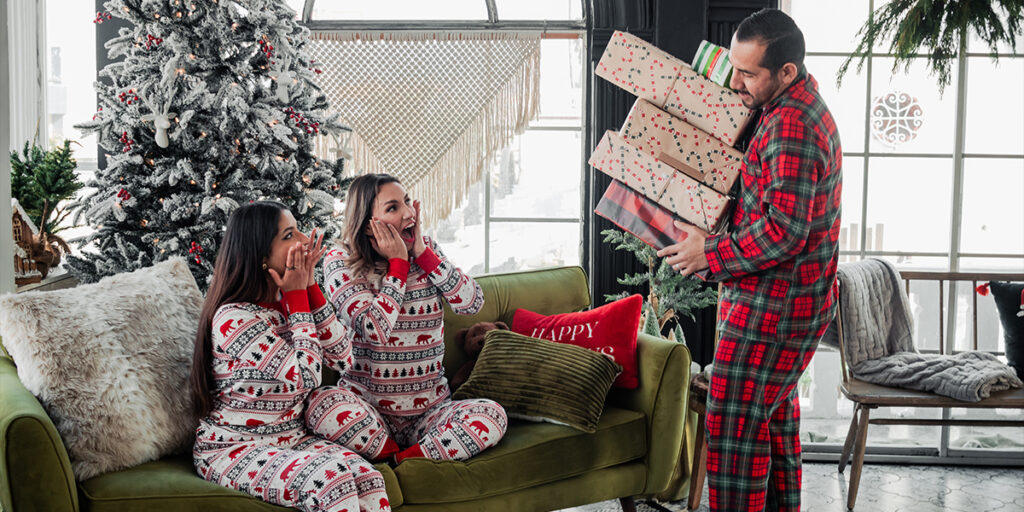 Family wearing Christmas pajamas