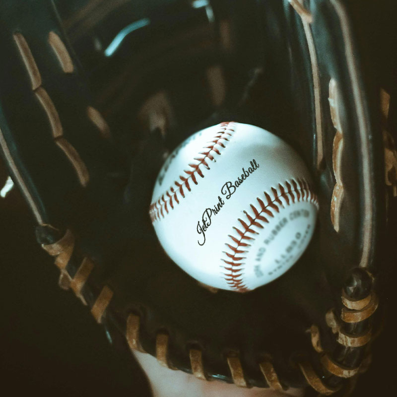 A baseball on a baseball glove