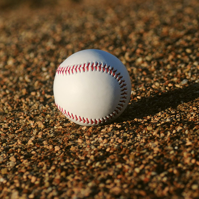 A baseball on the beach