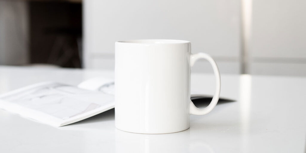 A white mug on the desk