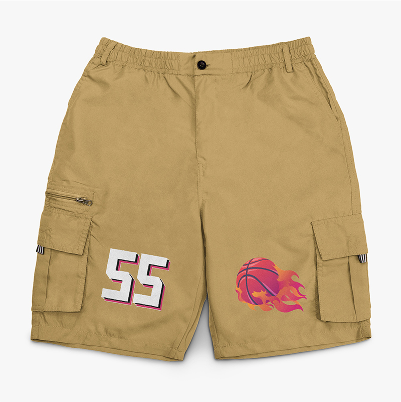 A pair of khaki cargo shorts printed with basketball graphics and numbers