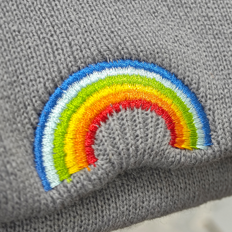 Embroidered rainbow logo