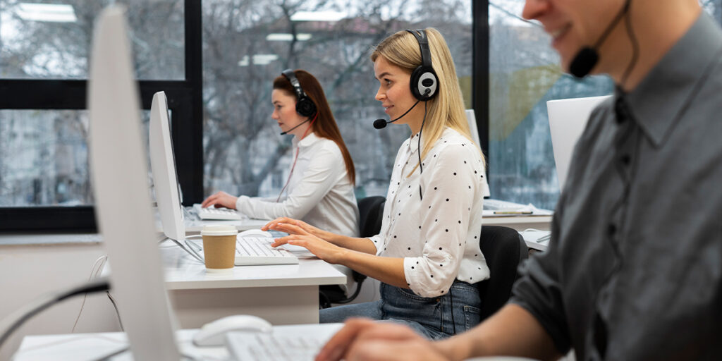 A group of customer service staff are responding to customers' requests