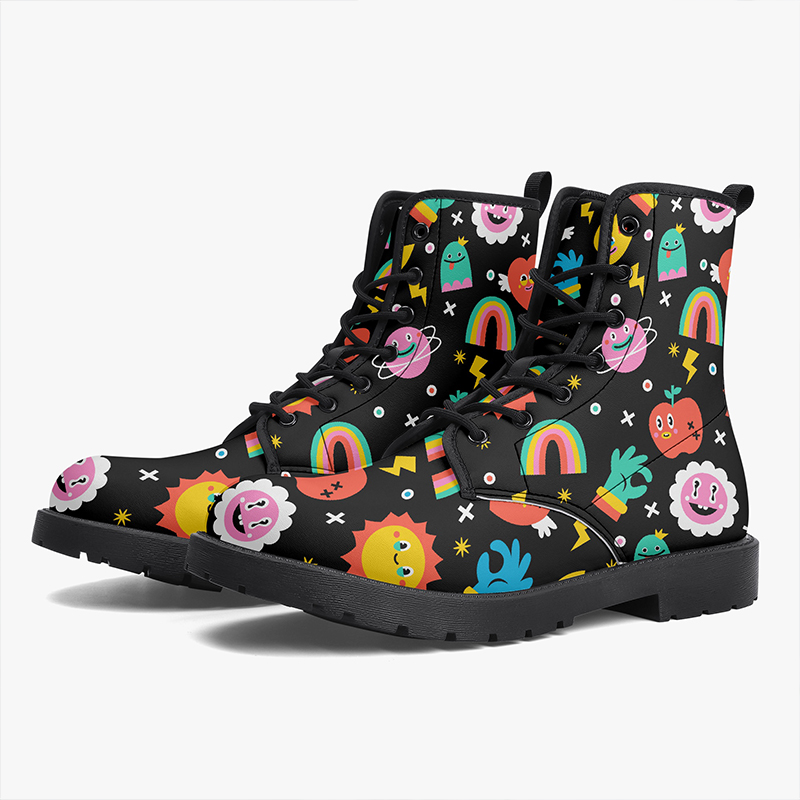 A pair of black boots with a rainbow pattern