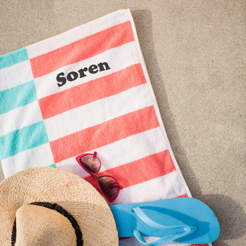 Beach towel with embroidered monogram