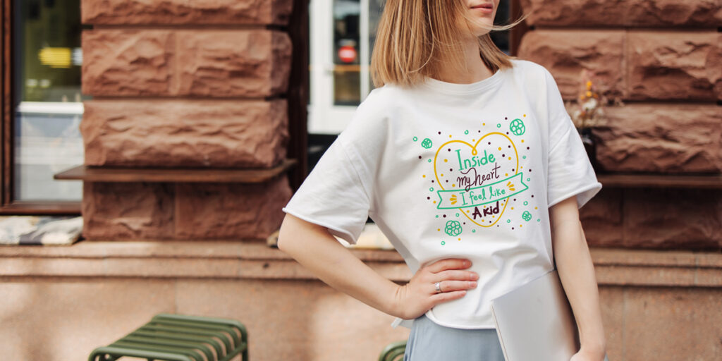 A woman wearing a white T-shirt with a cute saying